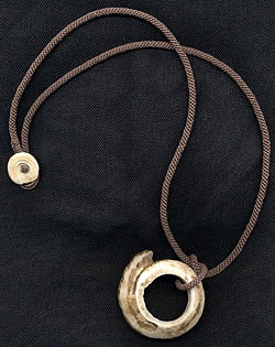 Katie Singer's Jewelry - Tuareg hairpiece and kwalia shell necklace